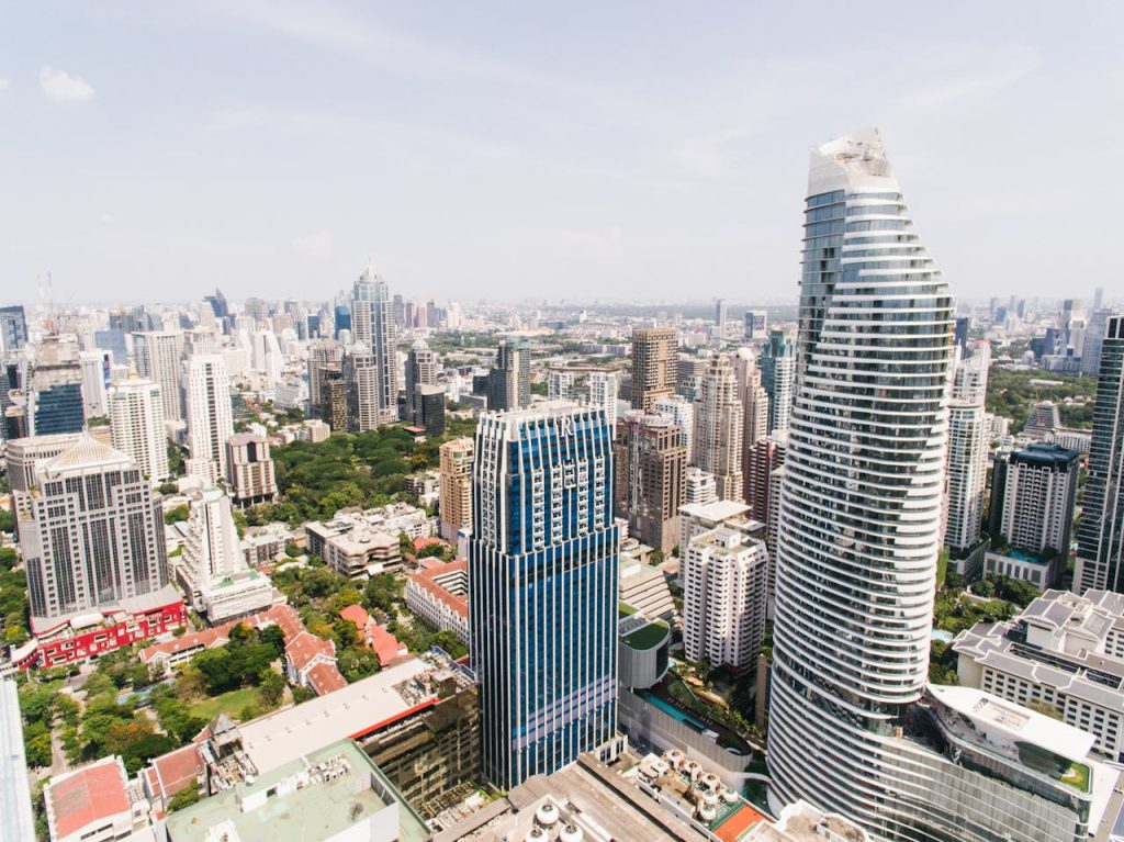 pexels-photo-8299714 Panoramic aerial view showcasing modern skyscrapers in a bustling city skyline.